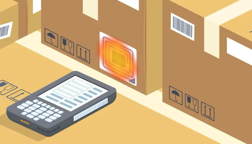 Skanowanie paczek za pomocą czytnika RFID. Nowoczesne zastosowania rfid w logistyce usprawniają śledzenie towarów.