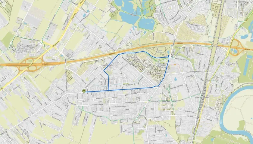 Mapa Poznania z zaznaczoną trasą spacerową, widoczne ulice, parki i jezioro.