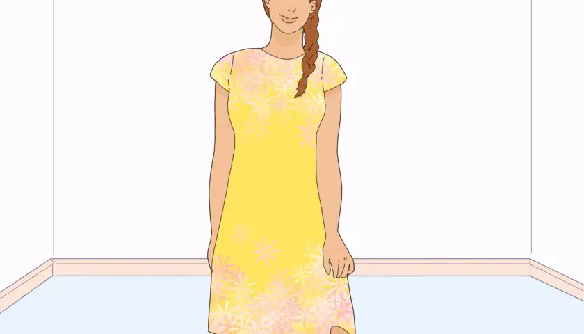 A woman in a yellow floral dress, ready to learn how to line a dress.
