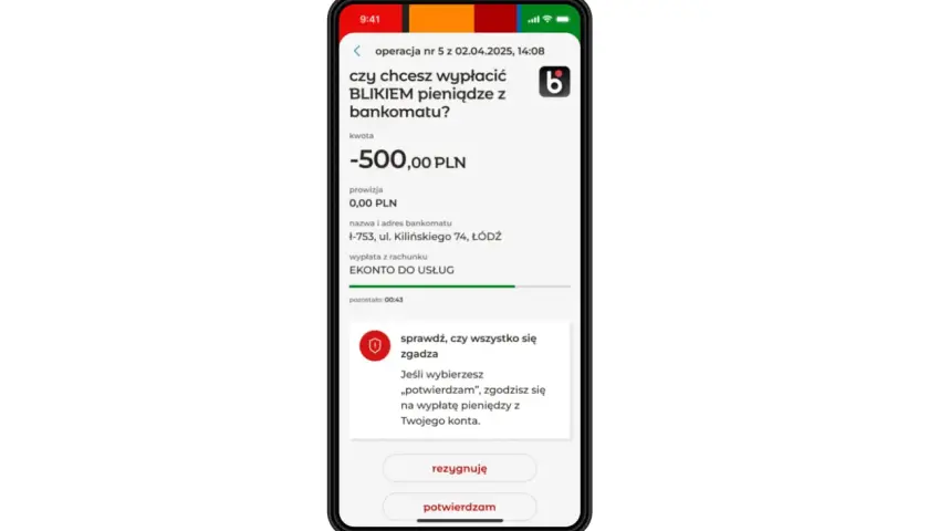 Ekran telefonu z potwierdzeniem wypłaty 500 zł BLIKIEM z bankomatu mBank.