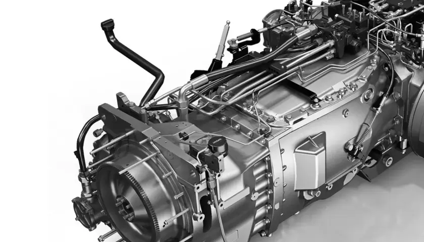 Skrzynia biegów ATF II D z licznymi przewodami hydraulicznymi i elementami mechanicznymi, gotowa do pracy.