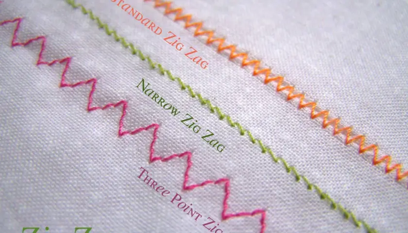 Three types of zig zag stitch shown on white fabric: standard, narrow, and three-point.