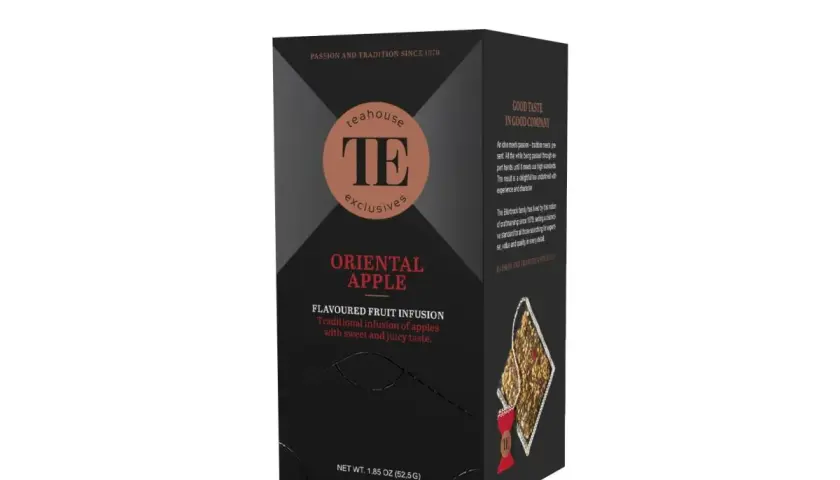 Pudełko herbaty **oriental apple** z napisem "Teahouse Exclusives". Tradycyjny napar owocowy o słodkim smaku.