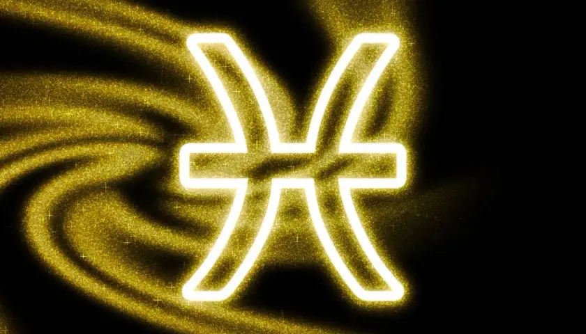 Symbol Ryb, 16 stycznia znak zodiaku, otoczony złotym pyłem i światłem.