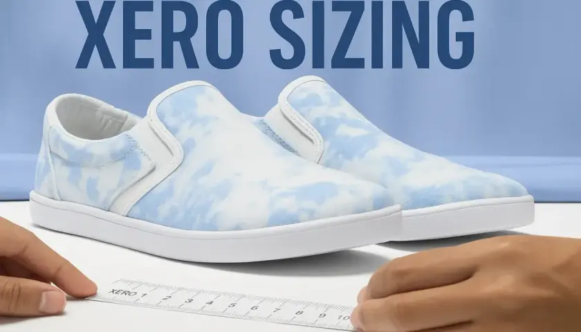 A Xero shoes size guide is shown with a ruler measuring a pair of blue and white tie-dye slip-on sneakers.