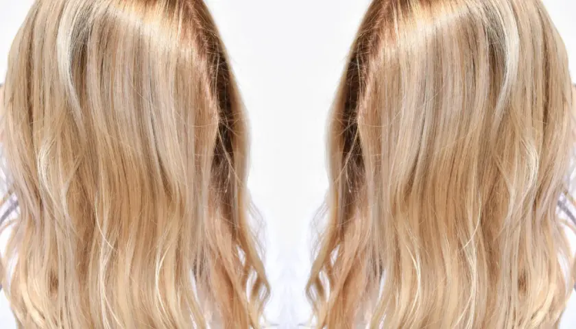Cabello rubio con mechas matizadas, mostrando un degradado natural y luminoso.