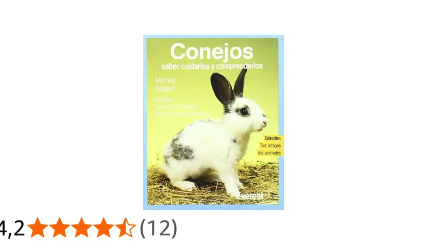 Un conejo blanco y negro en un libro sobre qué comen los conejos y cómo cuidarlos.