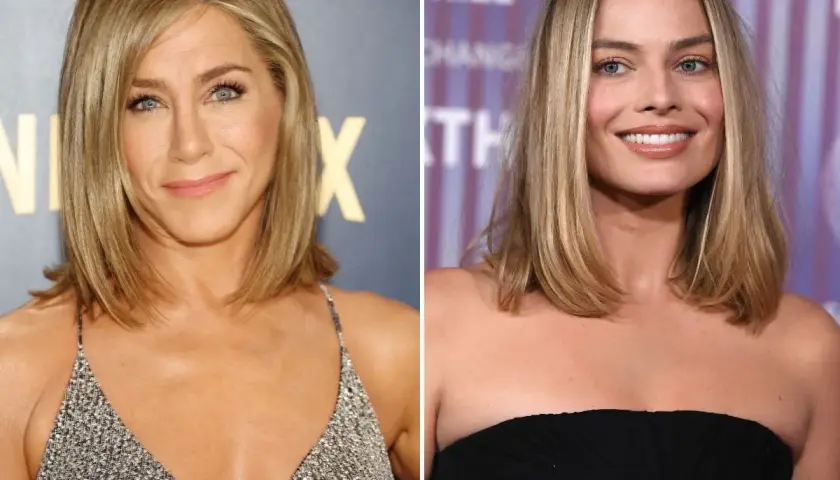 Jennifer Aniston i Margot Robbie z modnymi włosami do ramion, obie uśmiechnięte.