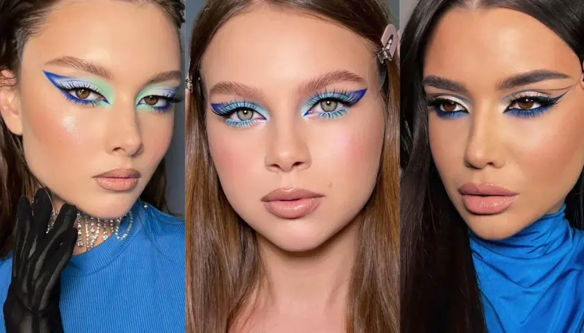 Maquillaje audaz con delineado azul eléctrico y sombras celestes, perfecto para un vestido azul marino.