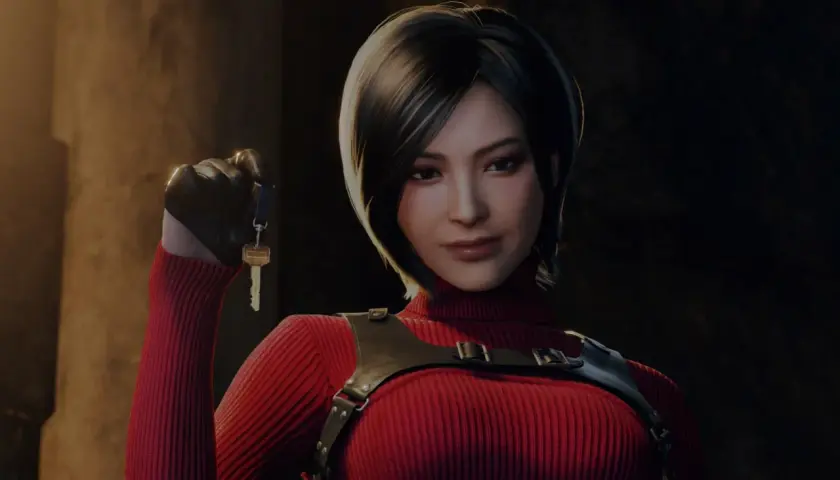 Ada Wong w czerwonym golfie i czarnych rękawiczkach trzyma klucz.