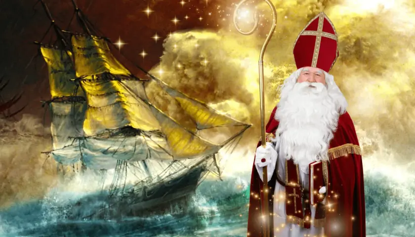 Święty Mikołaj z pastorałem i księgą na tle sztormowego żaglowca.