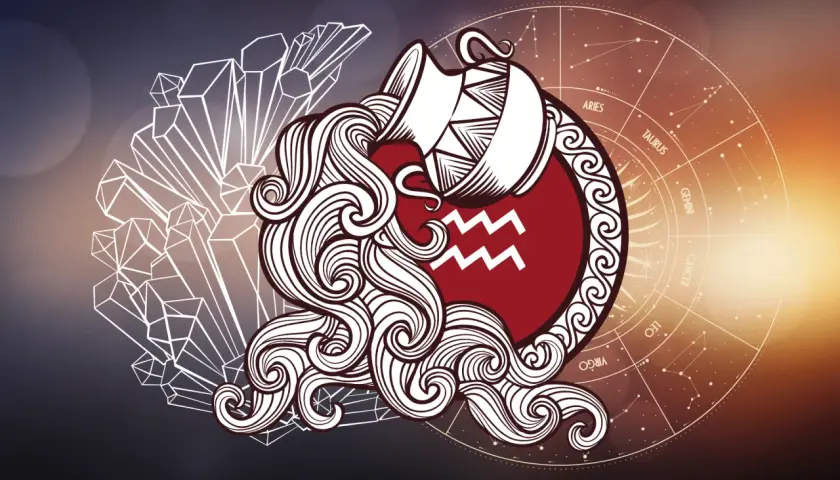 Symbol **Wodnik** w postaci dzbanka z wodą, otoczony kryształami i kołem zodiaku.