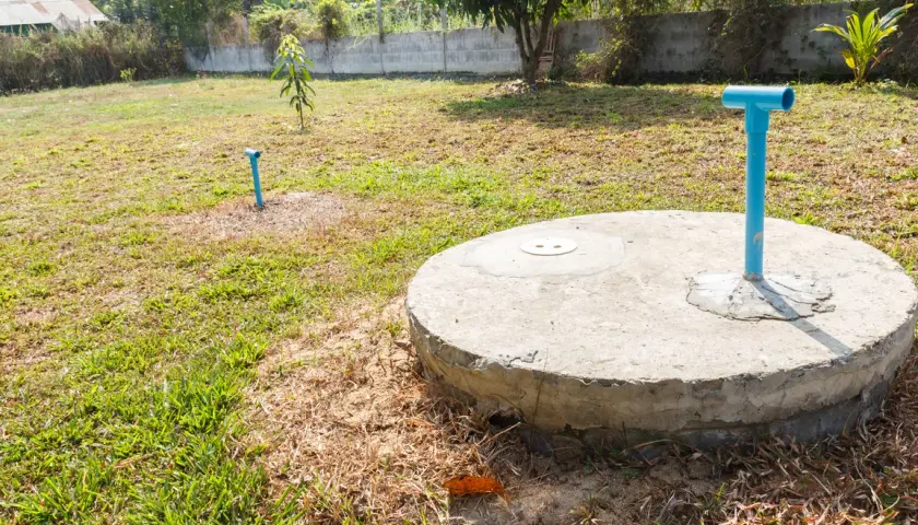 Ile kosztuje wybudowanie szamba na działce? Sprawdź ukryte wydatki