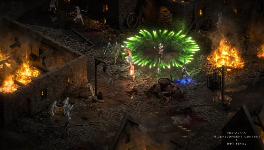 W mrocznym świecie Diablo II Resurrected, bohater walczy z hordą szkieletów, otoczony zieloną energią i płonącymi budynkami.