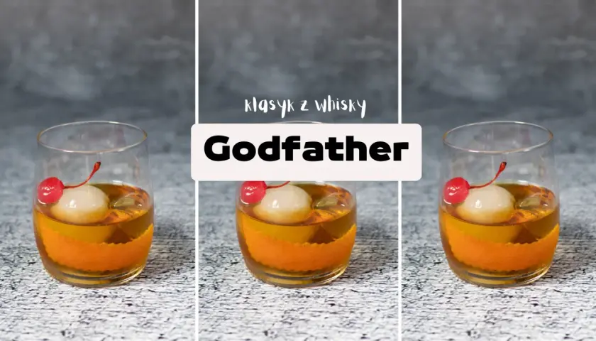 Klasyczny drink "Godfather" z amaretto i szkocką whisky, ozdobiony wiśnią i lodem.