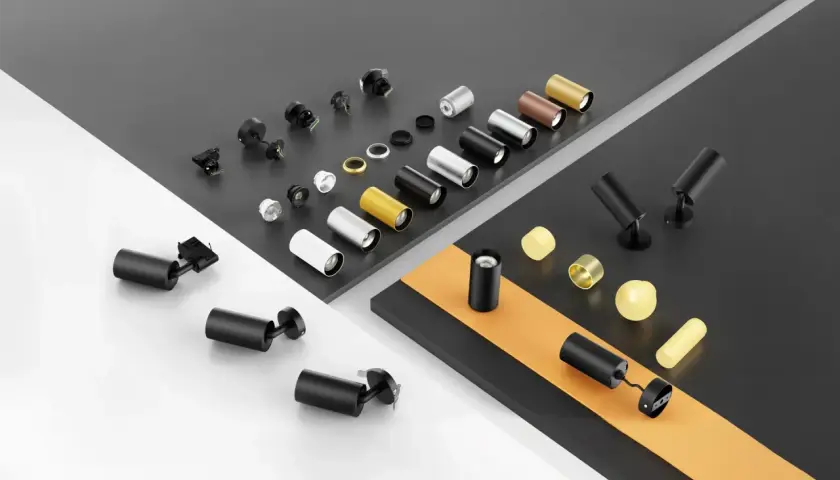 Variedad de focos empotrables y sus componentes. Diseños modernos en negro, blanco, dorado y plateado, listos para colocar y dar luz.
