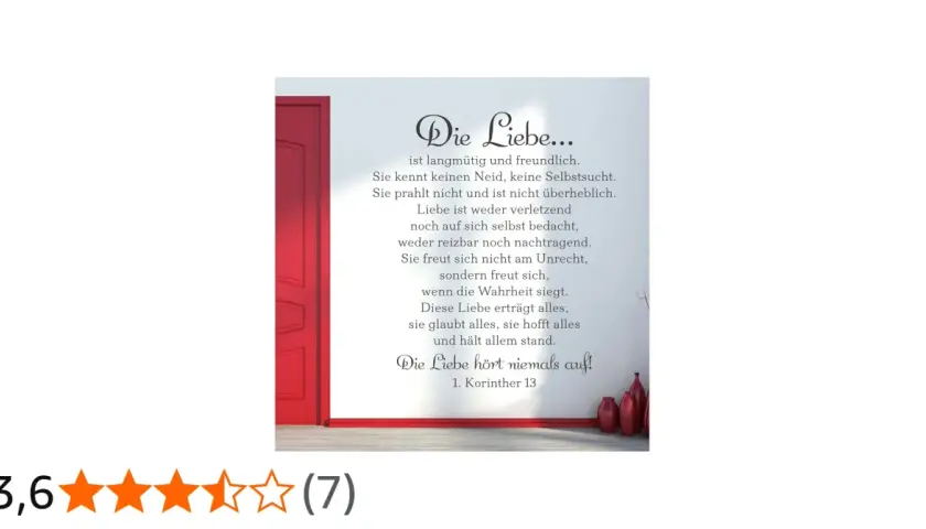 Wandaufkleber mit dem Text aus 1. Korinther 13 über die Liebe, neben einer roten Tür.