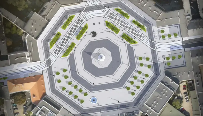 Nowoczesny plac wolności w Łodzi z zielonymi wyspami, szachownicą i torami tramwajowymi.