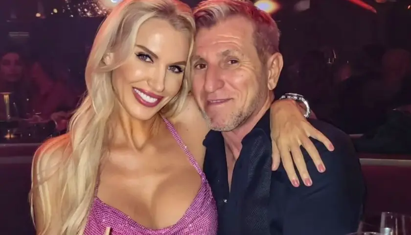 Aneta Glam z partnerem, uśmiechnięci, w eleganckim wnętrzu.