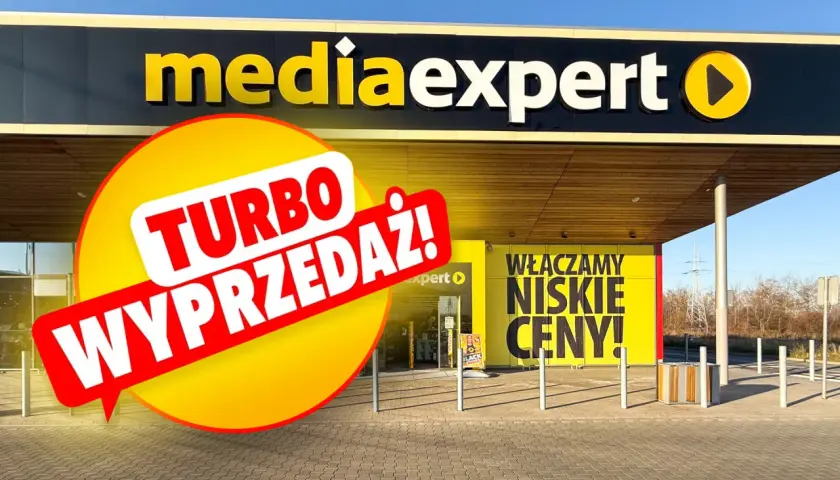 Logo Media Expert z napisem "Turbo wyprzedaż!" i hasłem "Włączamy niskie ceny!".