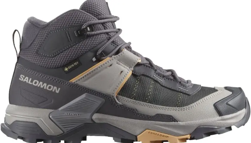 Szary, wysoki but trekkingowy Salomon X Ultra 5 Mid GTX z membraną Gore-Tex, idealny na górskie wędrówki.