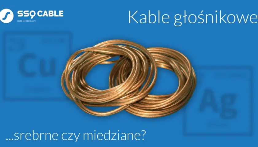 Dwa zwoje miedzianych kabli głośnikowych na niebieskim tle. Czy miedź to to, co najlepiej przewodzi prąd?
