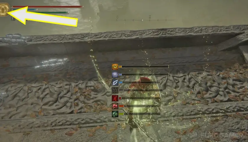 Wielki run Godricka widoczny na ekranie gry, obok paska zdrowia i many.