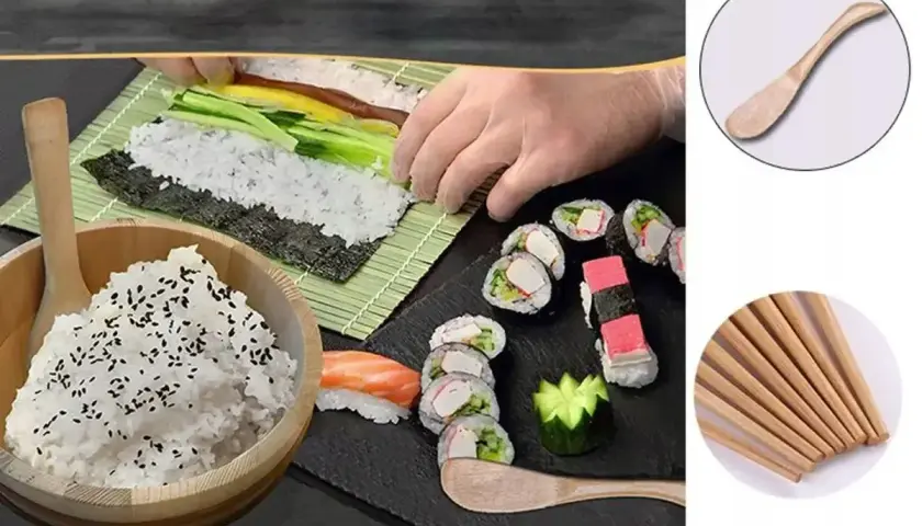 Przygotowanie sushi: ryż z sezamem, nori, ogórek, łosoś, gotowe rolki i bambusowe pałeczki.