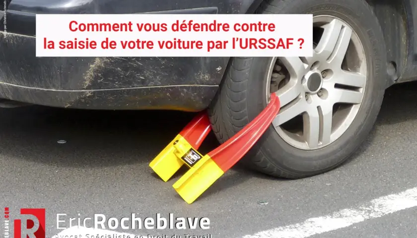 Une voiture est immobilisée par un sabot rouge et jaune, symbole d'une déclaration valant saisie par l'URSSAF.