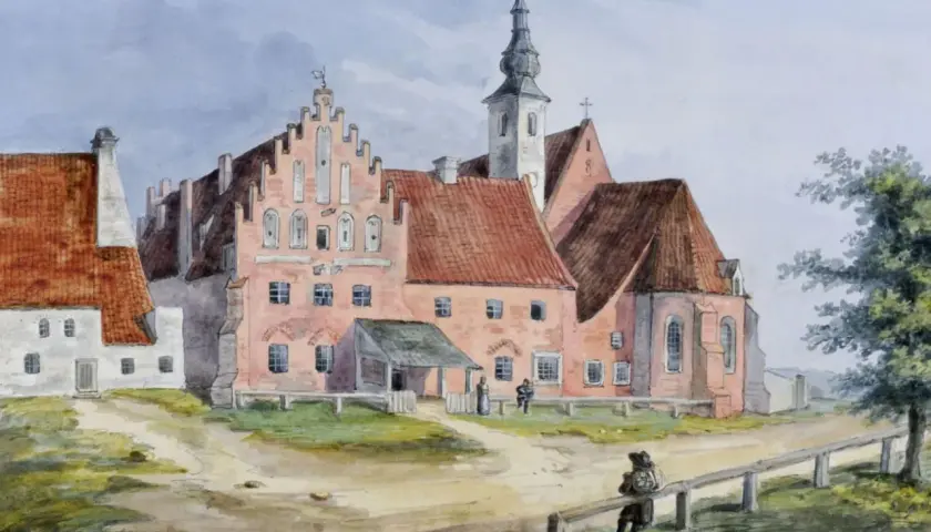 Akwarela przedstawia malowniczy klasztor ojców bernardynów z charakterystyczną wieżą i ceglanymi budynkami.