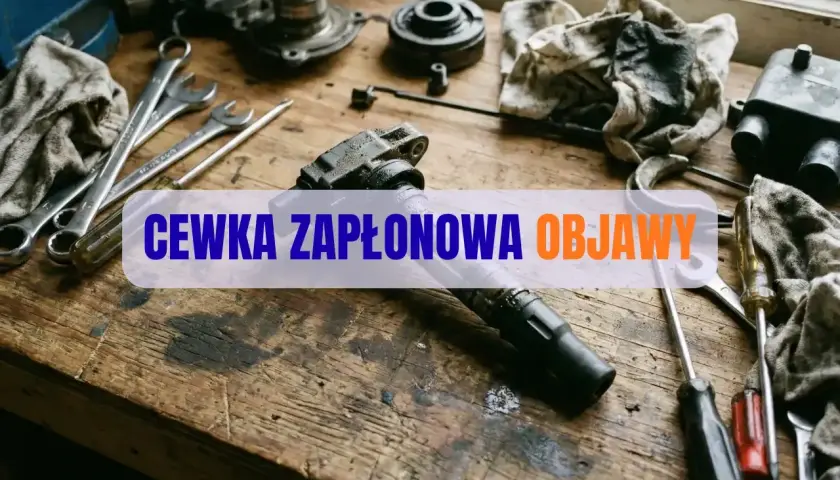 Warsztatowe narzędzia i części samochodowe, w tym cewka zapłonowa, gotowe do naprawy.