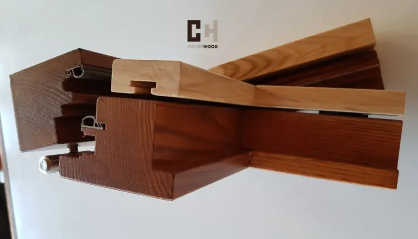 Sezioni di infissi in legno con profili in alluminio, per rivestire infissi in legno con alluminio, mostrando la robustezza e l'estetica.