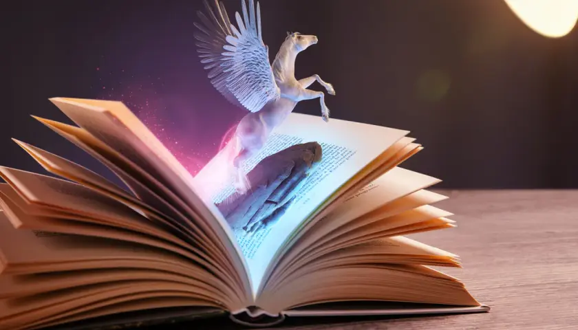 Pegaz wylatuje z otwartej księgi, symbolizując najlepsze książki fantasy. Magiczne światło otacza skrzydlatego konia.
