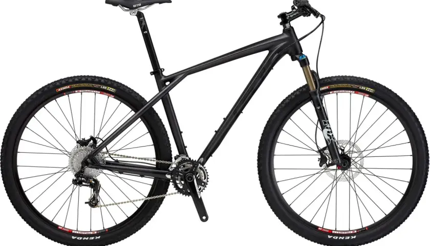 Sleek black GT Zaskar Carbon mountain bike with Kenda tires, Fox suspension fork, and WTB saddle, ready for any trail.