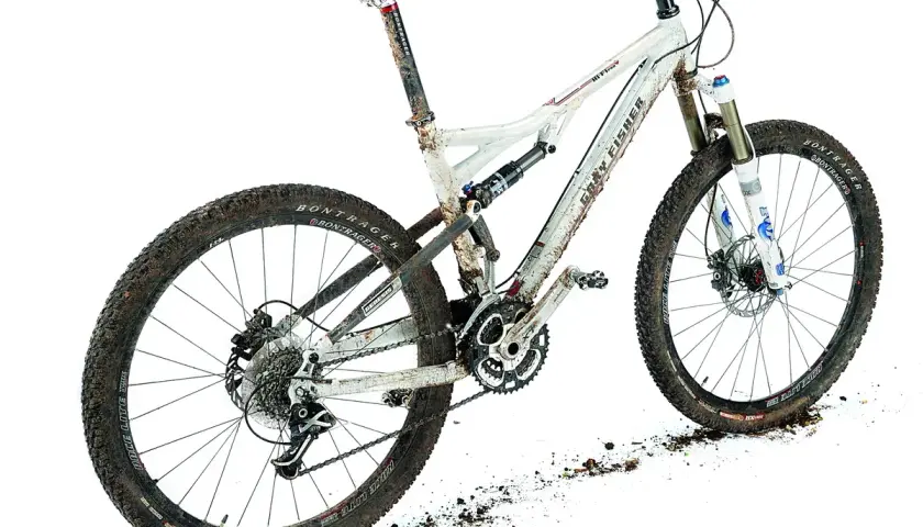 A dirty Gary Fisher HiFi Pro mountain bike, ready for its next trail adventure.