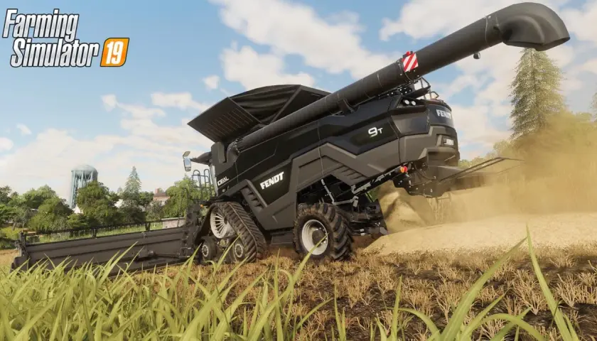 Une moissonneuse Fendt 9T travaille dans un champ, soulevant de la poussière. Le logo "Farming Simulator 19" est visible.
