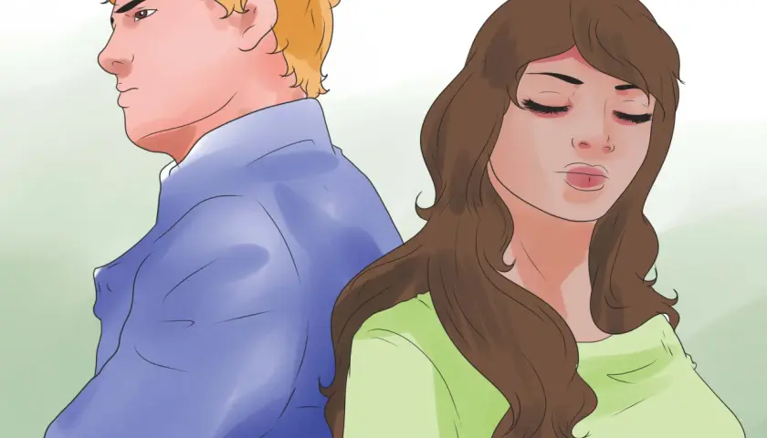Coppia distante dopo un litigio. Lei chiude gli occhi, lui guarda altrove. Un'immagine che suggerisce come farsi cercare dopo un litigio, con un po' di spazio e riflessione.