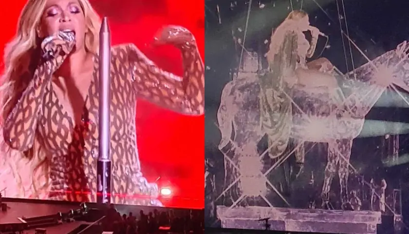 Beyoncé w błyszczącym stroju śpiewa na scenie, a obok niej widać jej sylwetkę na tle scenografii w kształcie konia. Niezapomniany koncert!