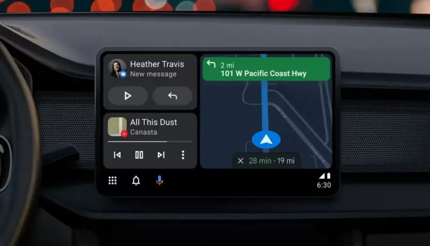 Navigazione con app Android Auto: messaggio da Heather Travis e musica in riproduzione, con indicazioni stradali per la Pacific Coast Hwy.