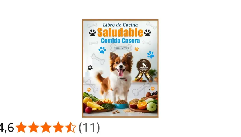 Libro de cocina "Saludable Comida Casera Para Perros" con un perro feliz rodeado de ingredientes frescos y huesos.