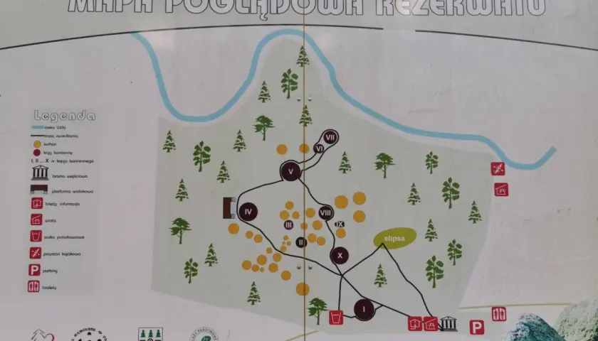 Mapa rezerwatu w Czersku z zaznaczonymi atrakcjami: kręgami kamiennymi, kurhanami, rzeką Wdą i trasami zwiedzania.