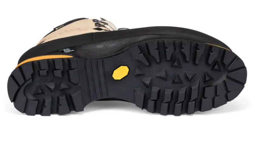 A hiking boot with a deep lug Vibram sole. While hairspray might make shoes non-slip temporarily, this boot's tread is designed for serious grip.