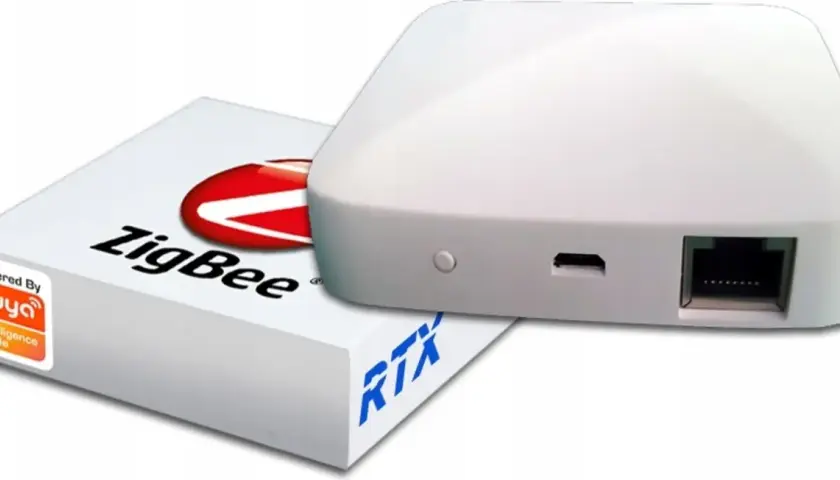 Biały hub ZigBee z logo Tuya Smart, gotowy do stworzenia inteligentnego domu.