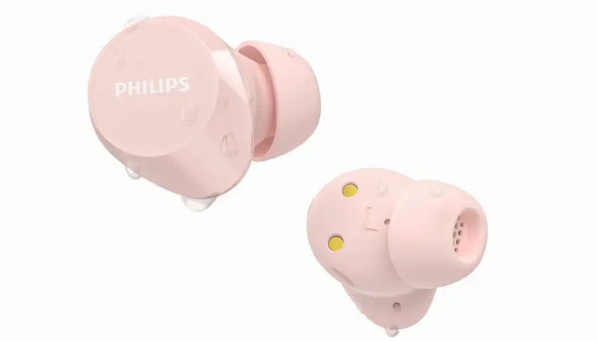 Różowe słuchawki Philips z oznaczeniem IPX4, odporne na zachlapanie, z widocznymi kroplami wody.