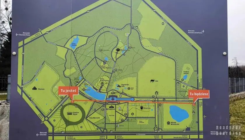 Mapa Parku Śląskiego z zaznaczonymi atrakcjami: zoo, planetarium, rosarium, skansen. Wskazuje drogę do zwiedzania.