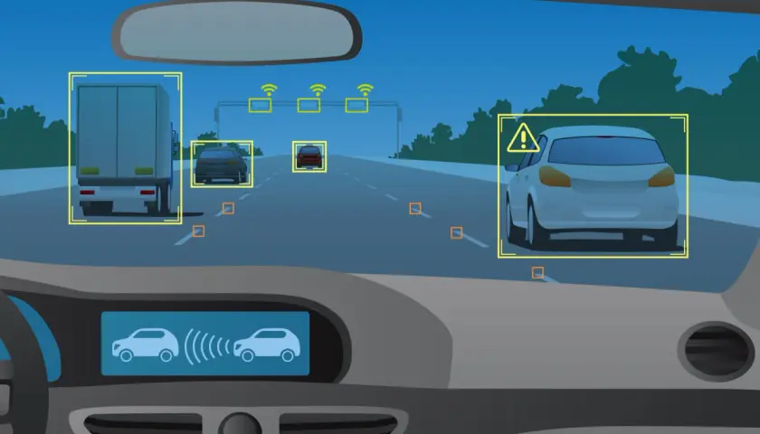 Vista dall'interno di un'auto con sistema ADAS attivo. Rileva camion, auto e segnali stradali, mostrando la sicurezza del futuro della guida.