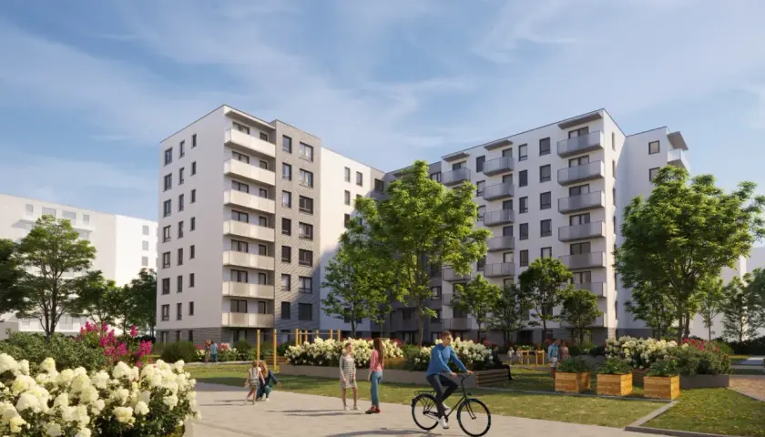 Nowoczesne osiedle Neopolis Ursus z zielonymi dziedzińcami, gdzie ludzie spacerują i jeżdżą na rowerze.