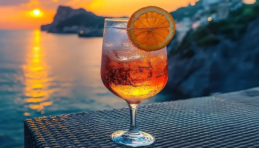 Orzeźwiający Crodino, co to jest? Ten aperitif idealnie pasuje do zachodu słońca nad morzem.