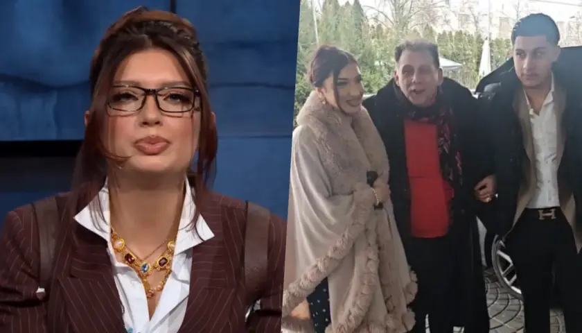Viki Gabor w eleganckim stroju i rodzina podczas uroczystości, być może ślub.