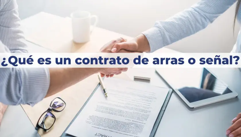 Apretón de manos sobre un contrato, con gafas y tablet. El texto pregunta: "¿Qué es un contrato de arras o señal?".